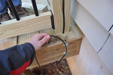 running electrical cable under deck